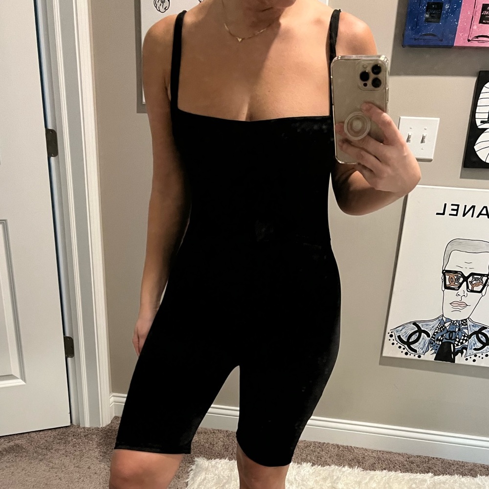 Black belted jumpsuit.